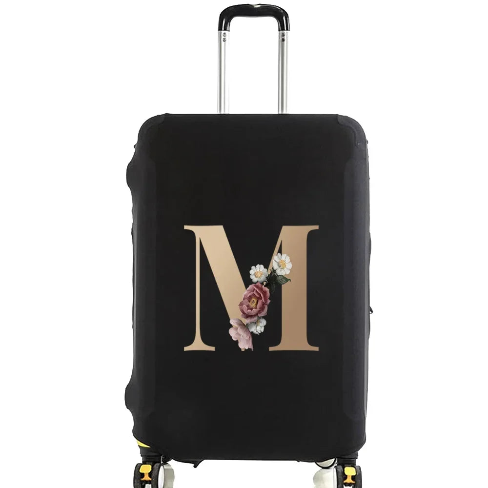 Black premium elastic luggage protective cover with a gold initial M and floral accents
