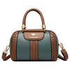 A brown leather shoulder crossbody bag with a woven texture and gold hardware.