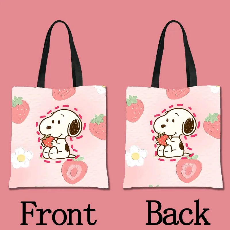 A pink canvas tote bag featuring a cartoon illustration of a white dog holding a strawberry on the front and back.