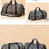 Maleta de viaje tipo duffel con estampado de leopardo en negro y marrón, con asas y compartimento para zapatos.