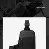 Black Oxford chest bag for men with a strap and pocket detail.