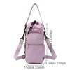 A light purple adjustable strap thermal water bottle bag with a zippered compartment.