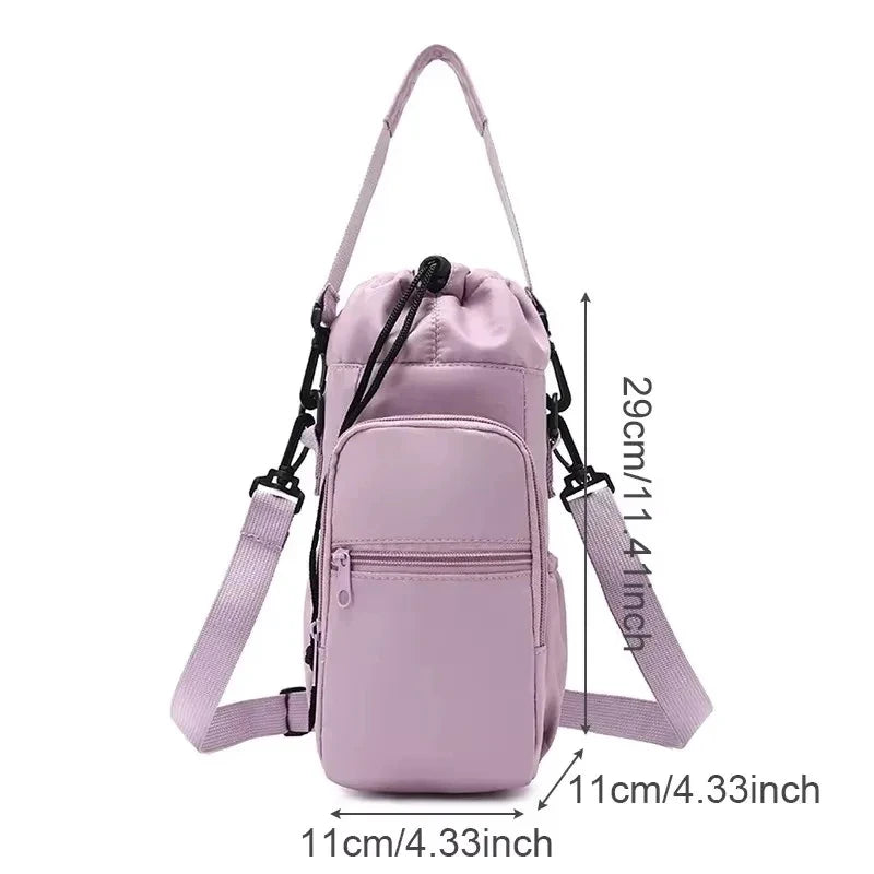 A light purple adjustable strap thermal water bottle bag with a zippered compartment.