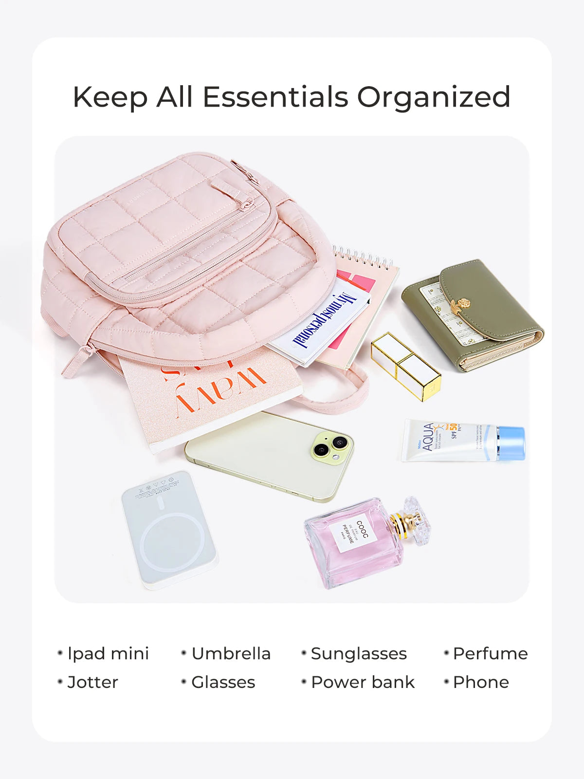 A pink quilted laptop backpack is shown with various essentials like a phone, power bank, sunglasses, and other small items.
