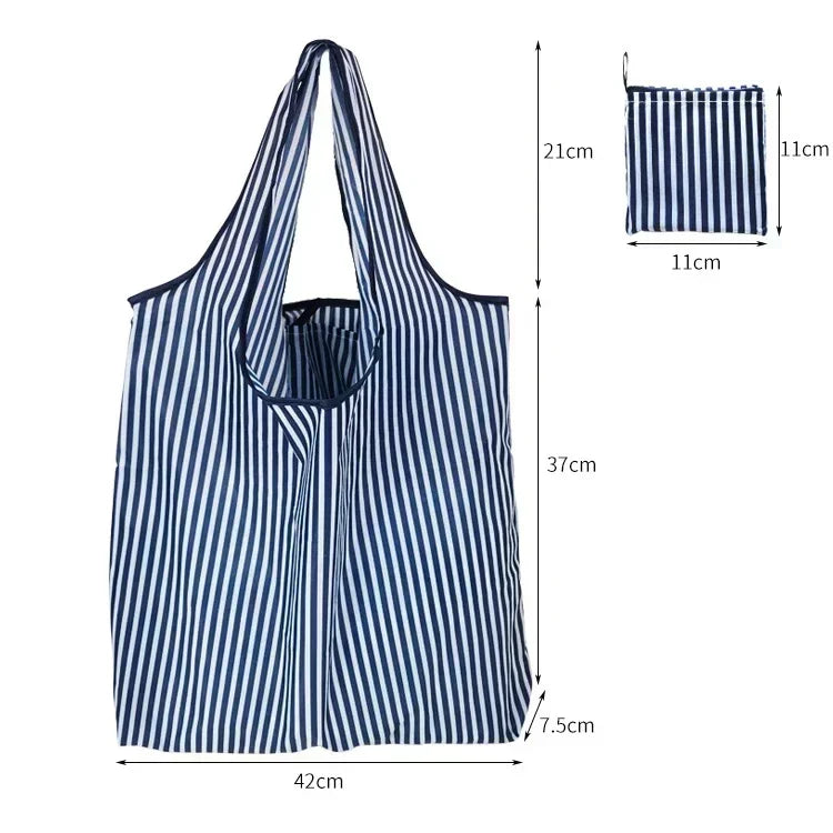 A navy blue striped reusable shopping tote bag shown flat and standing, with dimensions provided.
