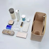 A collection of felt insert liners and accessories for handbags, including various shapes and colors.