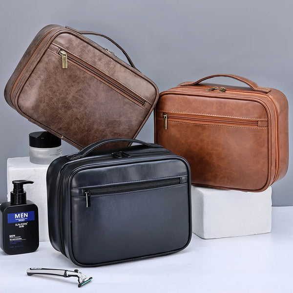 A collection of brown and black portable PU leather cosmetic organizer bags and a metal grooming tool on a white surface.