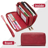 A red leather wallet shown with the inside and front open, displaying various cards and cash.