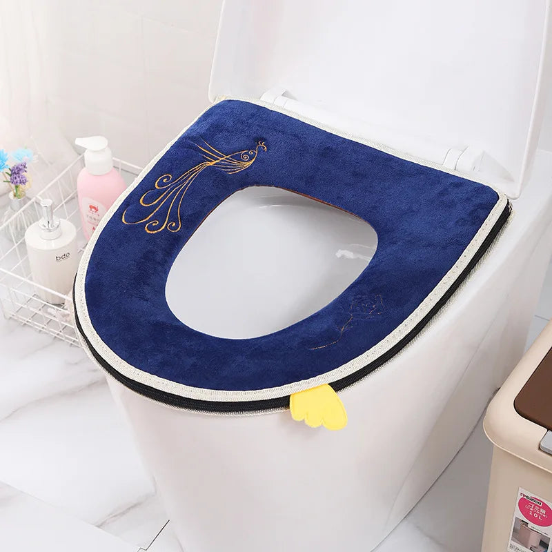 A dark blue plush waterproof toilet seat cover is shown placed inside a white toilet bowl.