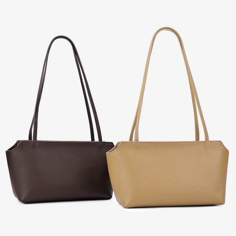 A pair of genuine leather mini shoulder bags in dark brown and beige with adjustable straps.