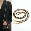 Gold and black chain shoulder strap for a luxury handbag