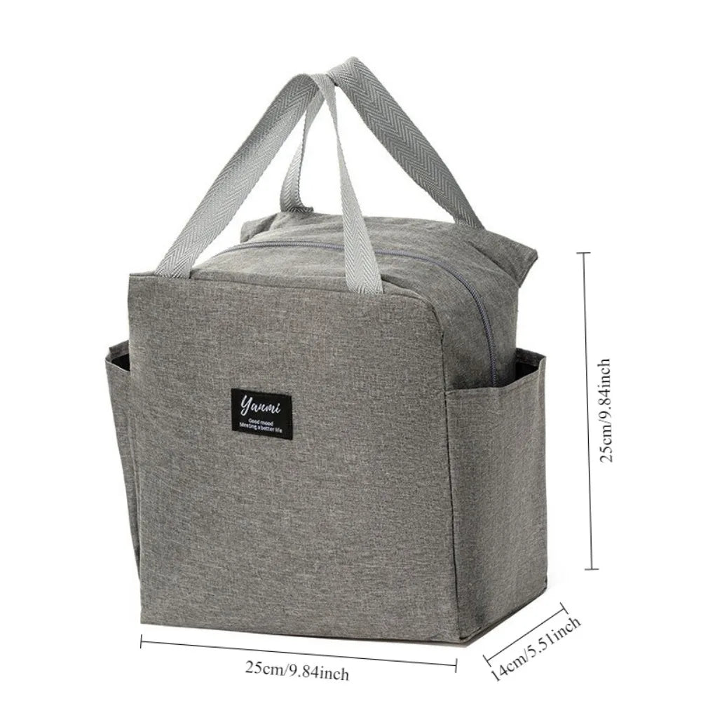 A gray insulated canvas tote bag with double pockets shown from the side.