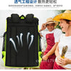 A black insulated backpack with green accents is shown being worn by a smiling person outdoors.
