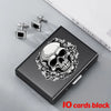 A black slim card holder wallet featuring a silver skull design surrounded by floral elements.