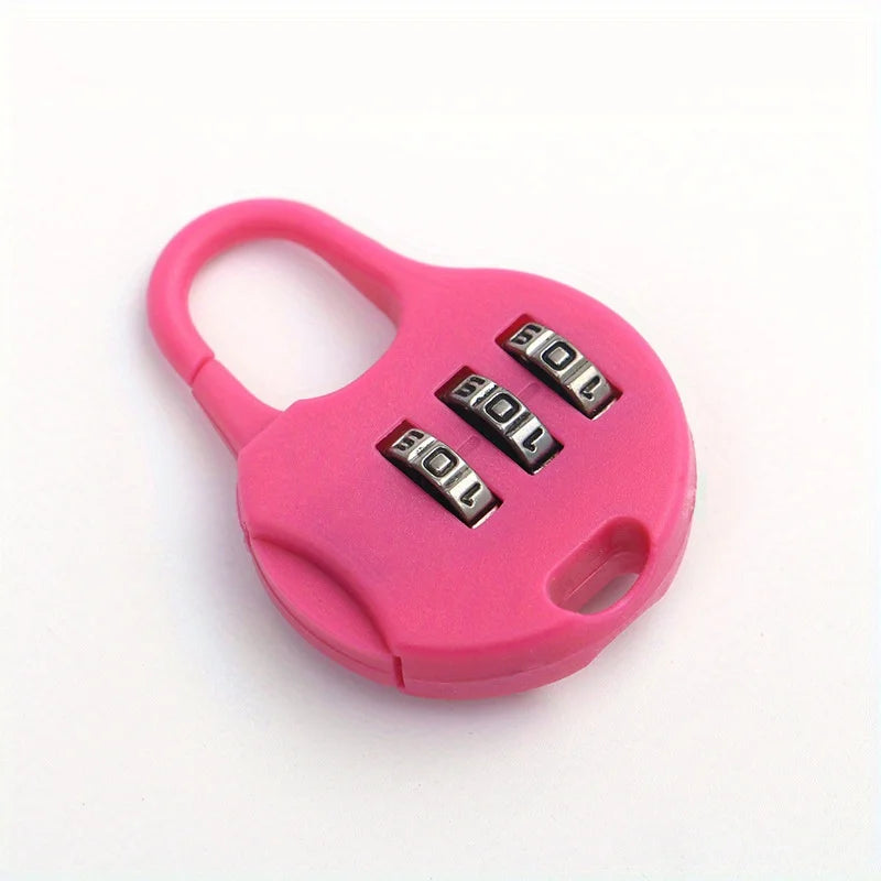 A pink compact 3-digit combination travel lock with a loop and three numbered dials.