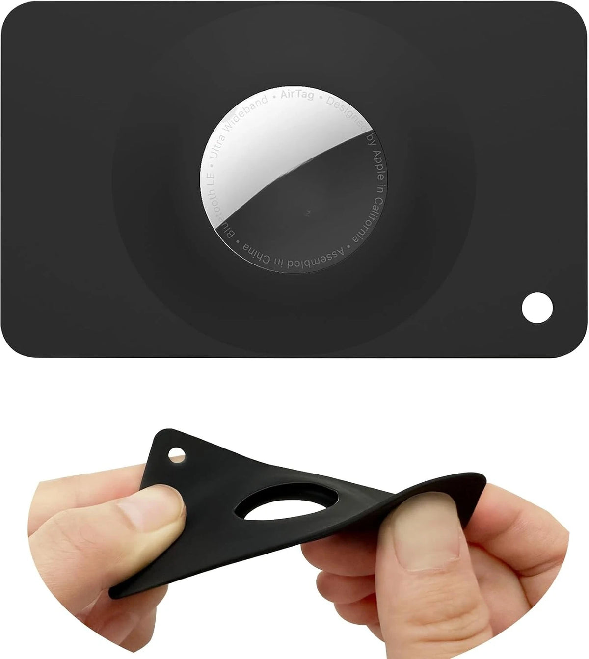 A hand holds a black MagSafe card wallet with a built-in AirTag pocket.