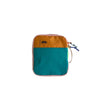 A teal and orange waterproof toiletry bag set with a small silhouette of a horse on the front.