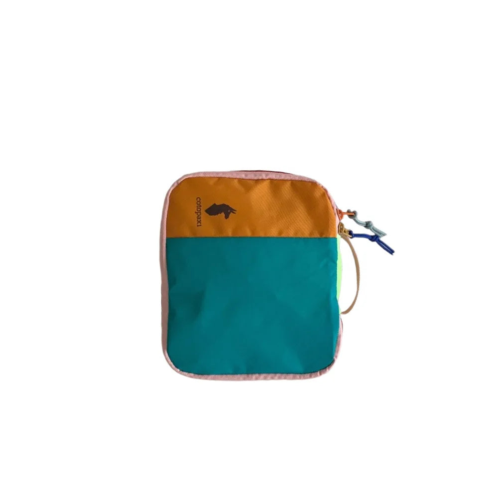 A teal and orange waterproof toiletry bag set with a small silhouette of a horse on the front.