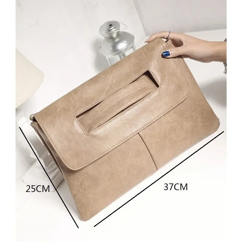 A tan leather crossbody clutch bag shown from above with dimensions 25cm by 37cm.