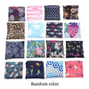 A collection of colorful patterned fabric pouches and bags in various designs