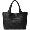 Black handwoven vegan leather tote bag with a woven texture.