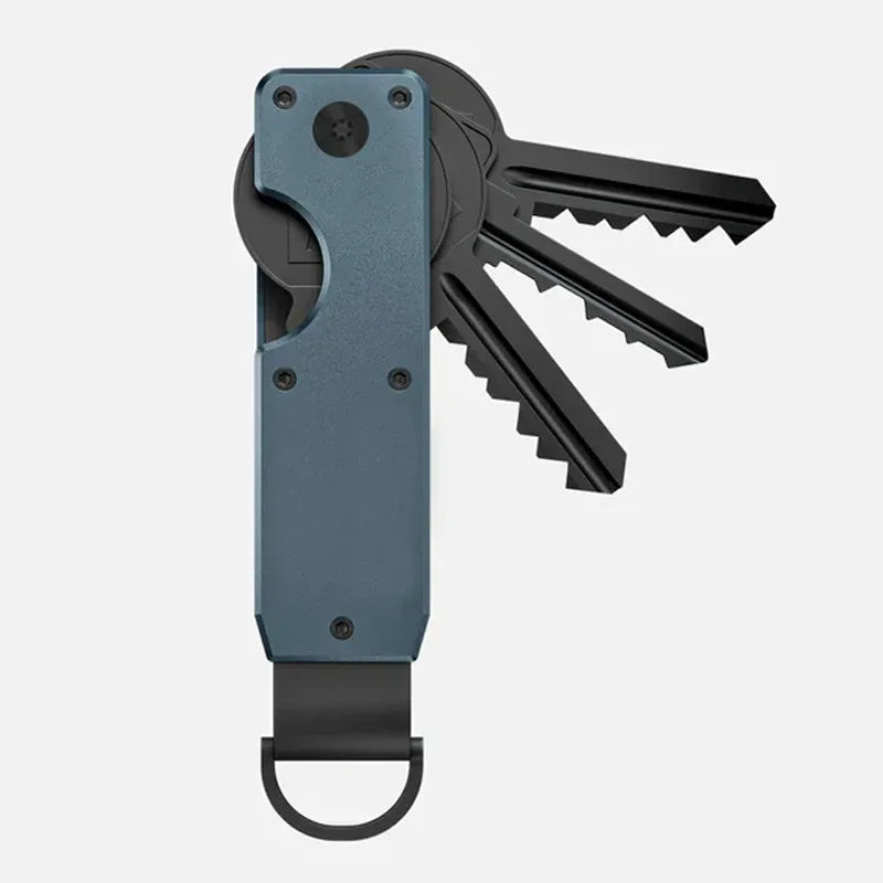 Porte-clés organiseur en métal minimaliste avec corps bleu foncé et inserts de clés noires.