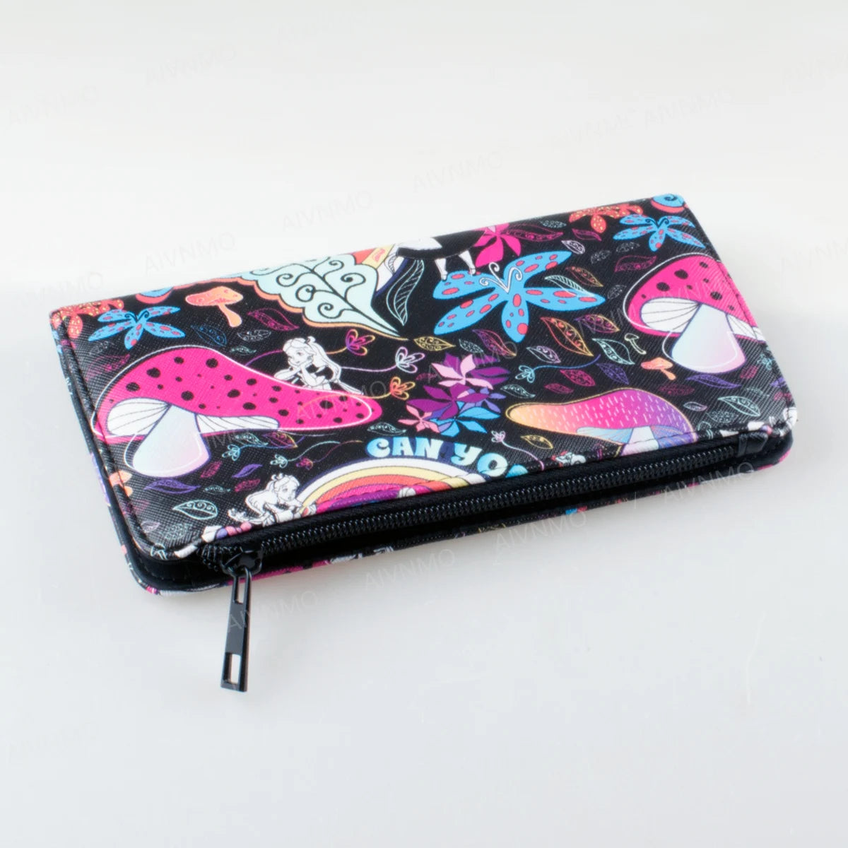 A black patterned bifold wallet with a zipper and an ID window is shown against a white background.