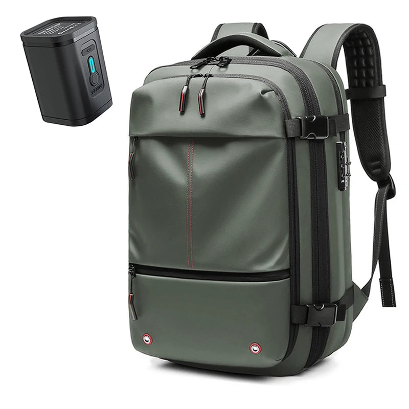 A dark olive green heavy duty laptop backpack with vacuum compression features is shown next to its separate power unit.