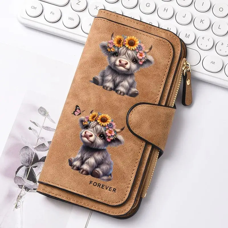 A brown leather zipper wallet featuring a small, fluffy puppy with flowers printed on it.