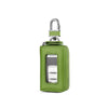 A green leather car key case with a transparent window and a metal clasp.