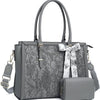 A gray PU leather laptop tote bag featuring a floral pattern and adorned with a matching scarf and clutch.