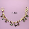 Goldkette mit schwarzen Schmetterlings- und Blumendeasen, 26,5 cm lang.