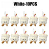 Ten white realistic bread plush keychains hanging by a string.