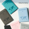A collection of light blue, gray, and pink slim PU passport holders for travel documents.