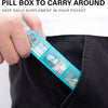 A hand holds a clear pill box organizer with daily supplements inside, demonstrating how to carry medication around.