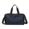 Navy waterproof travel duffle bag with black handles and a separate shoe compartment
