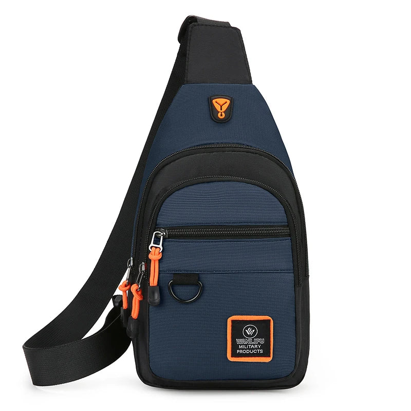 A navy blue nylon chest bag with an orange strap and a yellow logo patch.