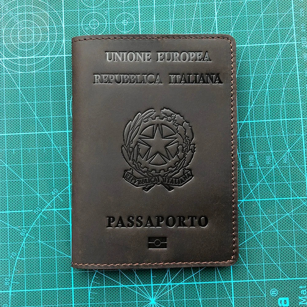 A dark brown leather passport holder for the Italian Republic of Italy, featuring the European Union emblem and the word PASS