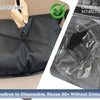 A black reusable vacuum storage bag being used to store a fork, demonstrating its durability and reusability.