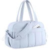 A white versatile large capacity travel and fitness bag with padded straps.