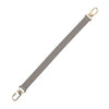 A beige genuine leather replacement shoulder strap with gold-toned hardware.