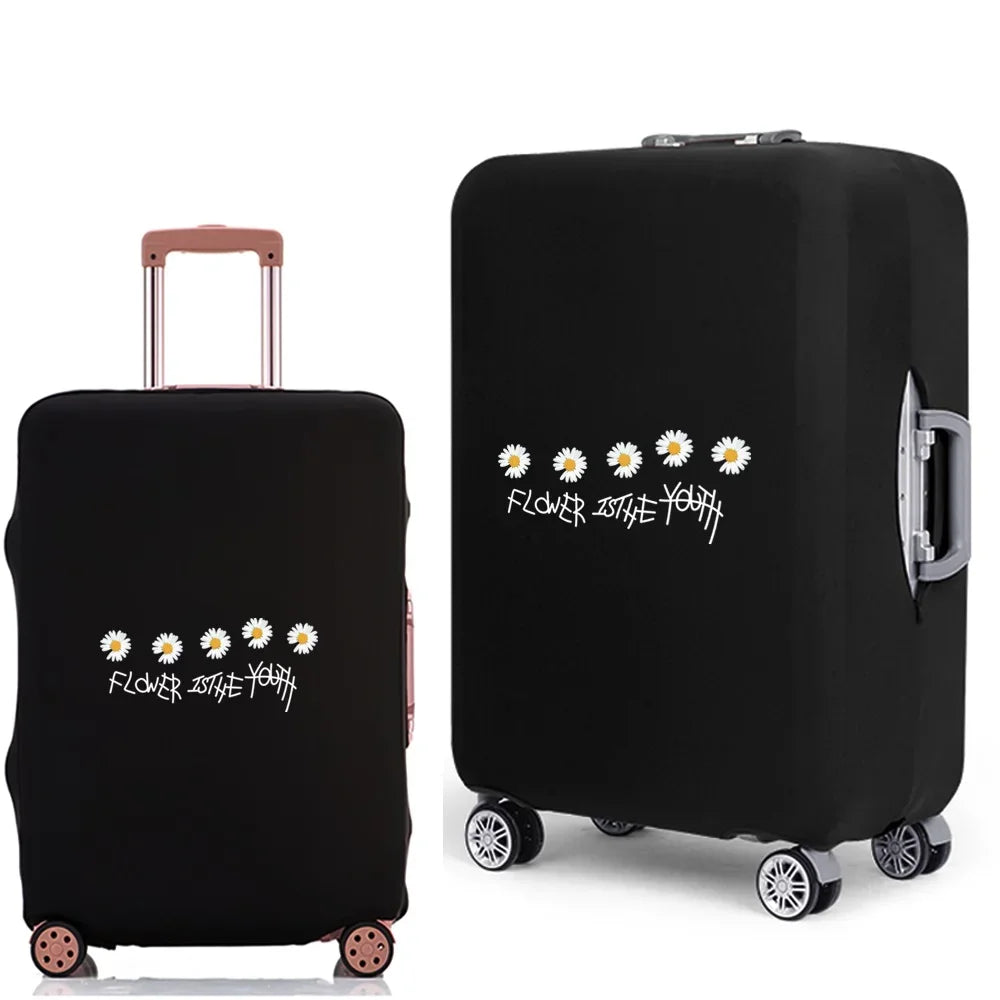 Black rolling suitcase with a floral design printed on the side.