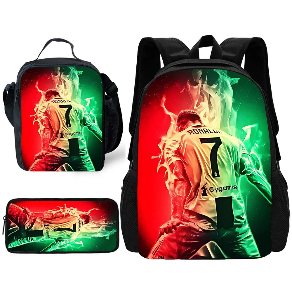 A set of three backpacks featuring a soccer player graphic with glowing green and red effects.