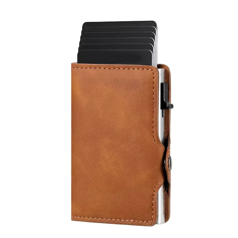 A brown leather card holder with a black sleeve for storing credit cards.