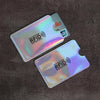 Two plastic card sleeves with RFID protection labels are shown on a dark surface.