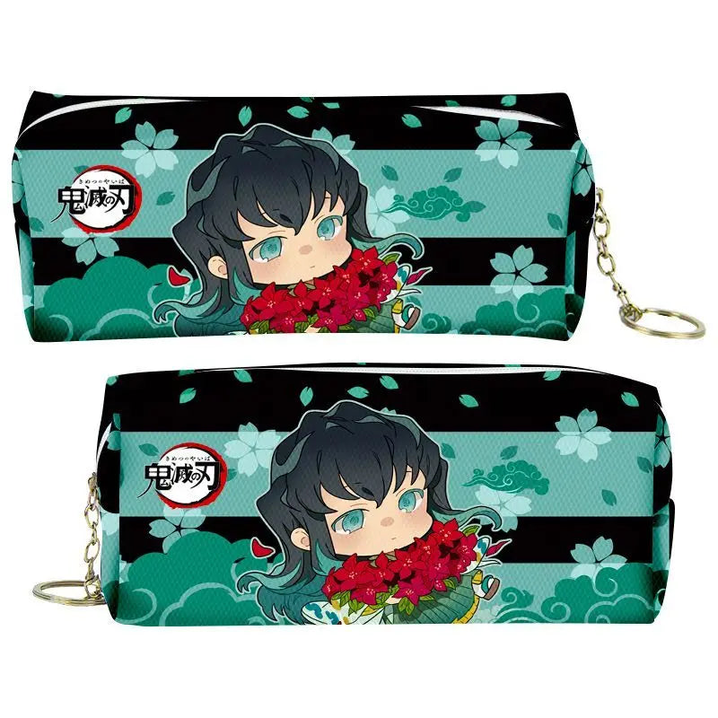 A black and teal pencil case featuring a Demon Slayer character design with red flowers.