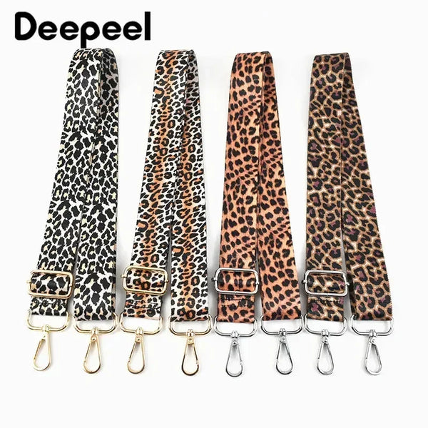 A set of leopard print adjustable crossbody straps for bags shown against a white background.