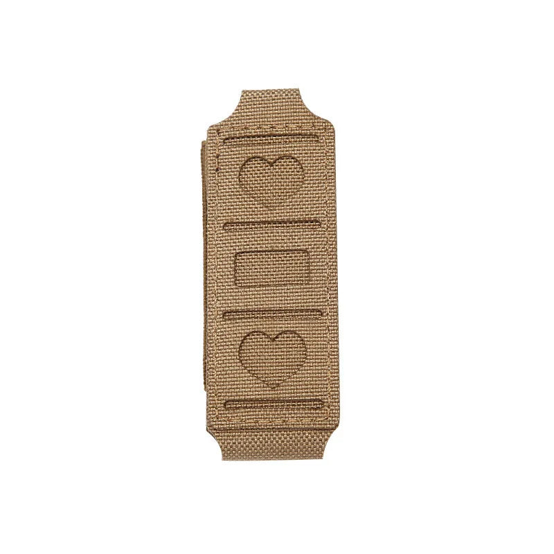 A tan leather holster designed to hold a magazine inside the waistband for concealed carry.