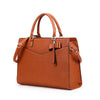 A brown premium PU leather laptop tote bag with leather handles and a flap closure.