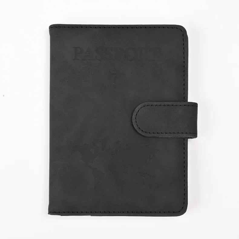 A black genuine PU leather passport and ticket wallet cover with a stitched flap.